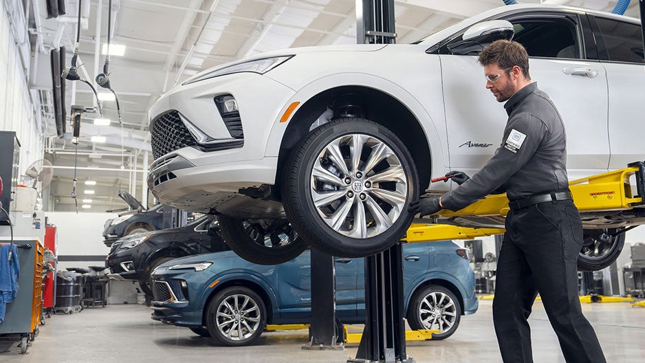 Mechanic working on Buick Vehicle